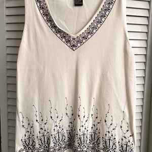 White sleeves top with a lot of detail